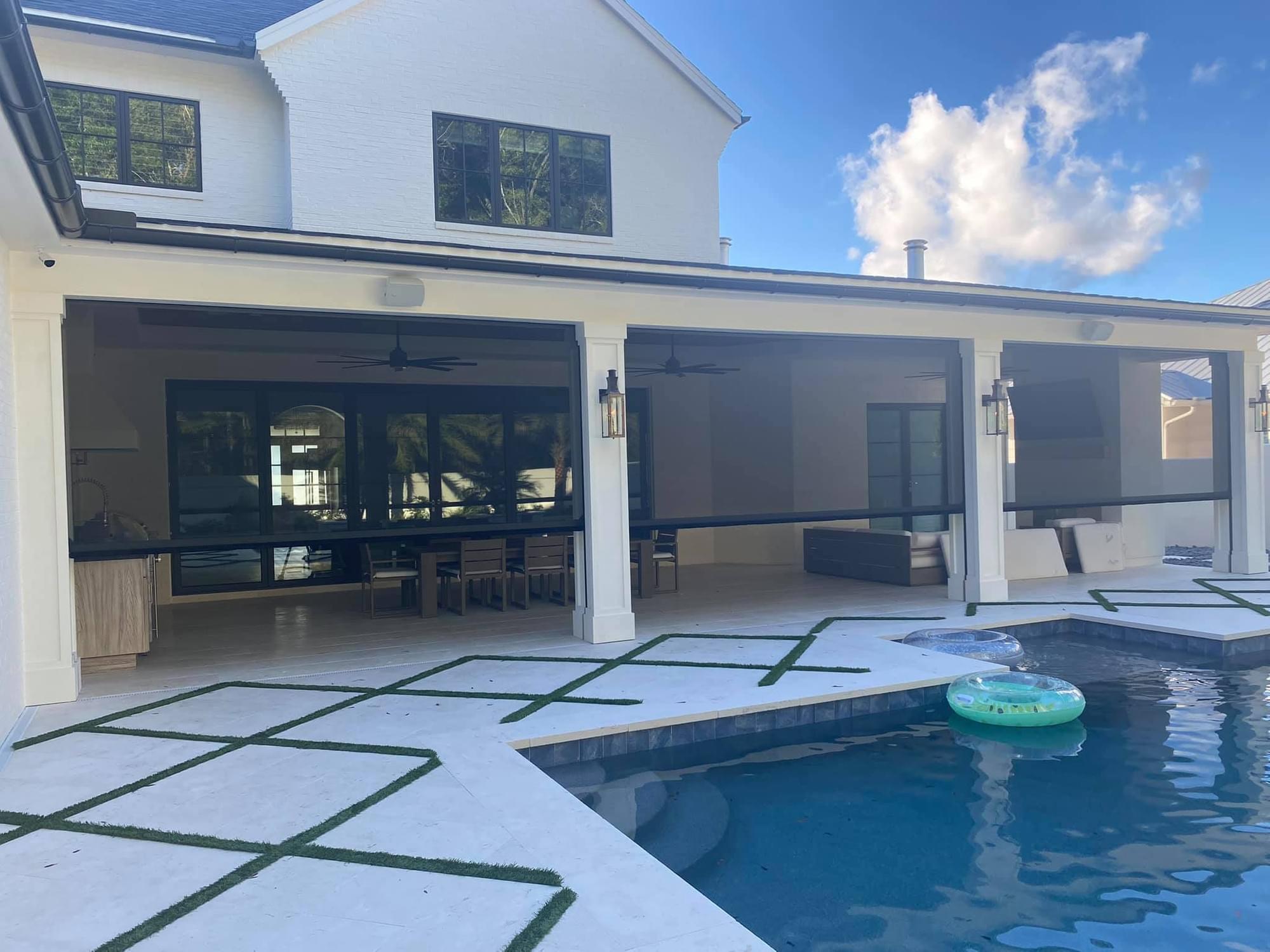 Luxury Florida outdoor space with motorized retractable screens